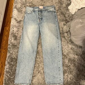 High waisted light wash jeans.